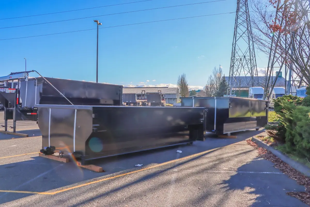 Roll-off dumpster ready for waste disposal at job site for 4 Yard Dumpster Rental in West Springfield Town